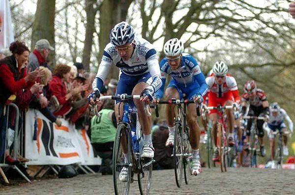 Flecha and Boonen go over the top on lap 1