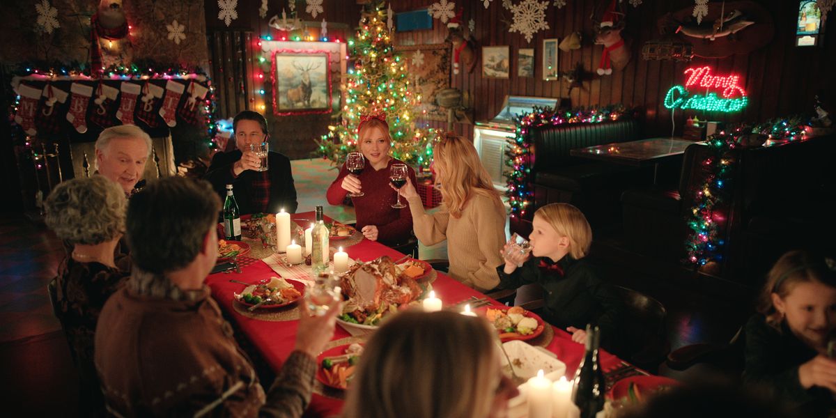 (L to R) Tom Butler as Sam, Martin Henderson as Jack Sheridan, Alexandra Breckenridge as Mel Monroe, Ezra Wilson as Theo at the Christmas table.