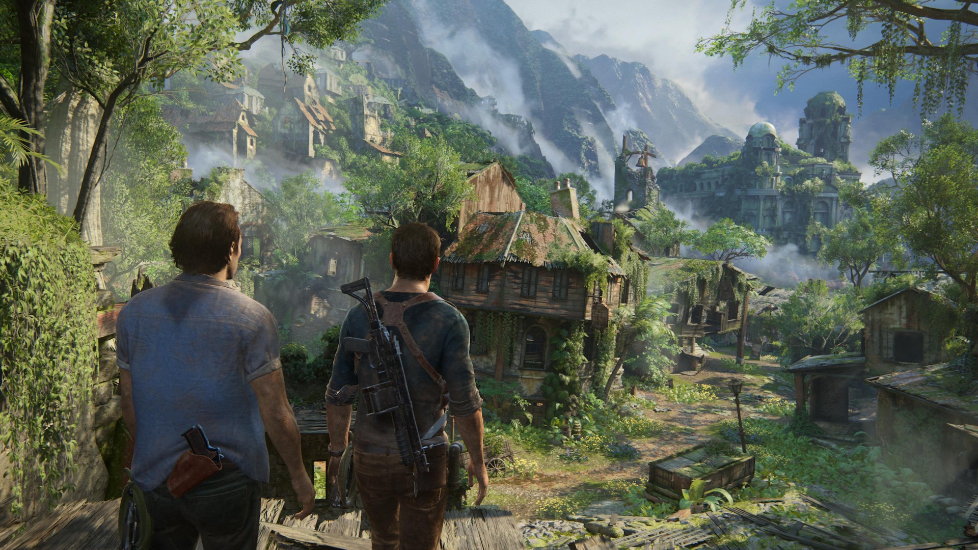Nathan and Sam Drake look out across an overgrown pirate town, in Uncharted 4, from the PS5's Uncharted: Legacy of Thieves Collection