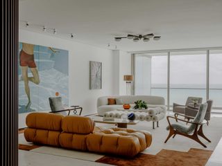 a living room with a camaleonda sofa