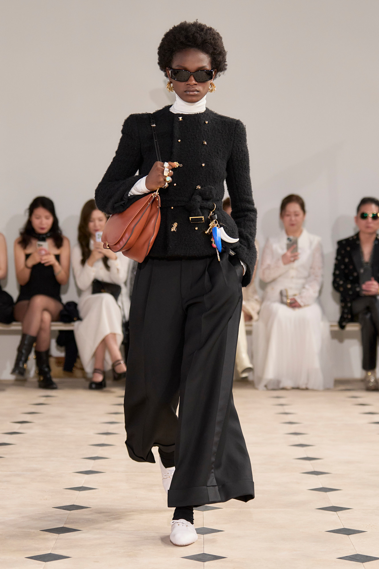 Celine Spring 2026 model on the runway wearing the derby shoe trend