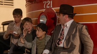 Bob Hoskins rides a street car with some young kids in Who Framed Roger Rabbit.