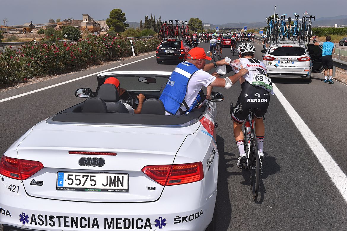 Medic attends to Soren Kragh Andersen (Sunweb)