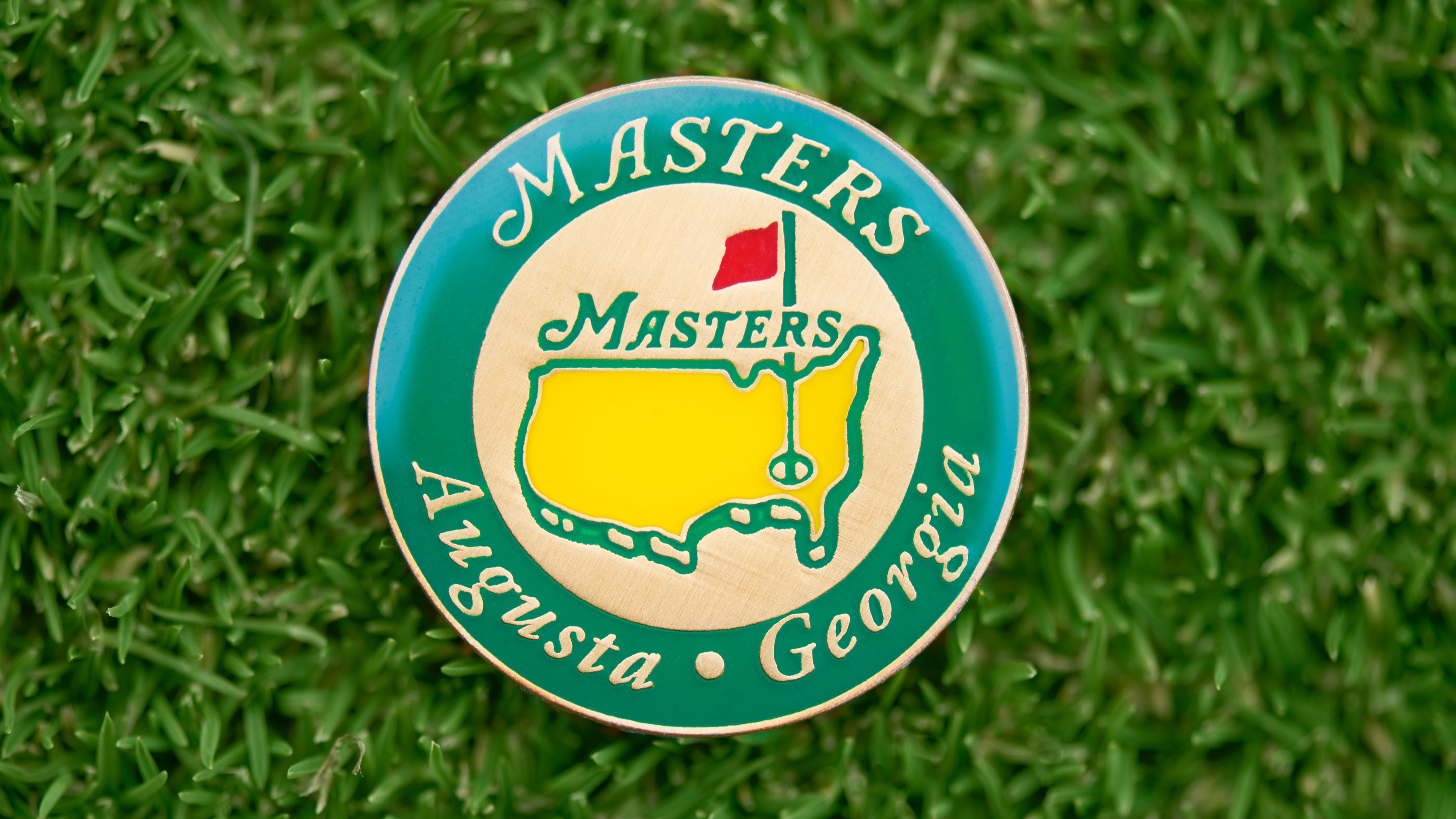 In this photo illustration a US Masters Ball Marker is displayed on a golf green at Coombe Hill Golf Club, Kingston on April 1, 2026 in London, England.