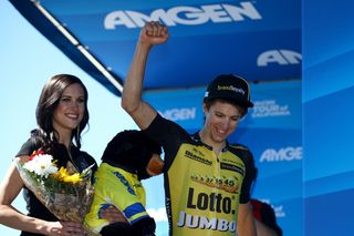 George Bennett (LottoNL-Jumbo) punches the air as he arrives on the podium