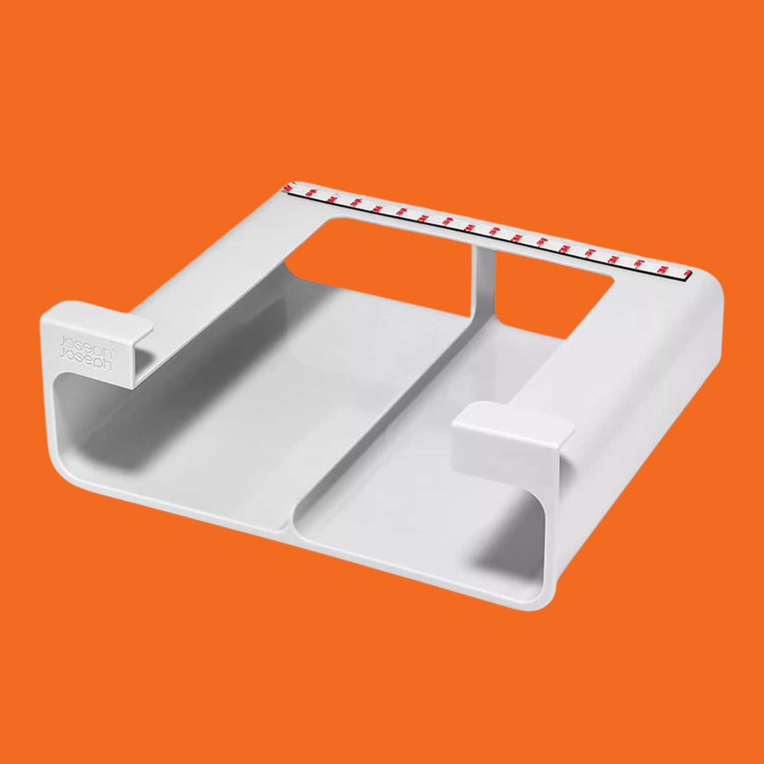 A stone-colored foil organizer against an orange backdrop