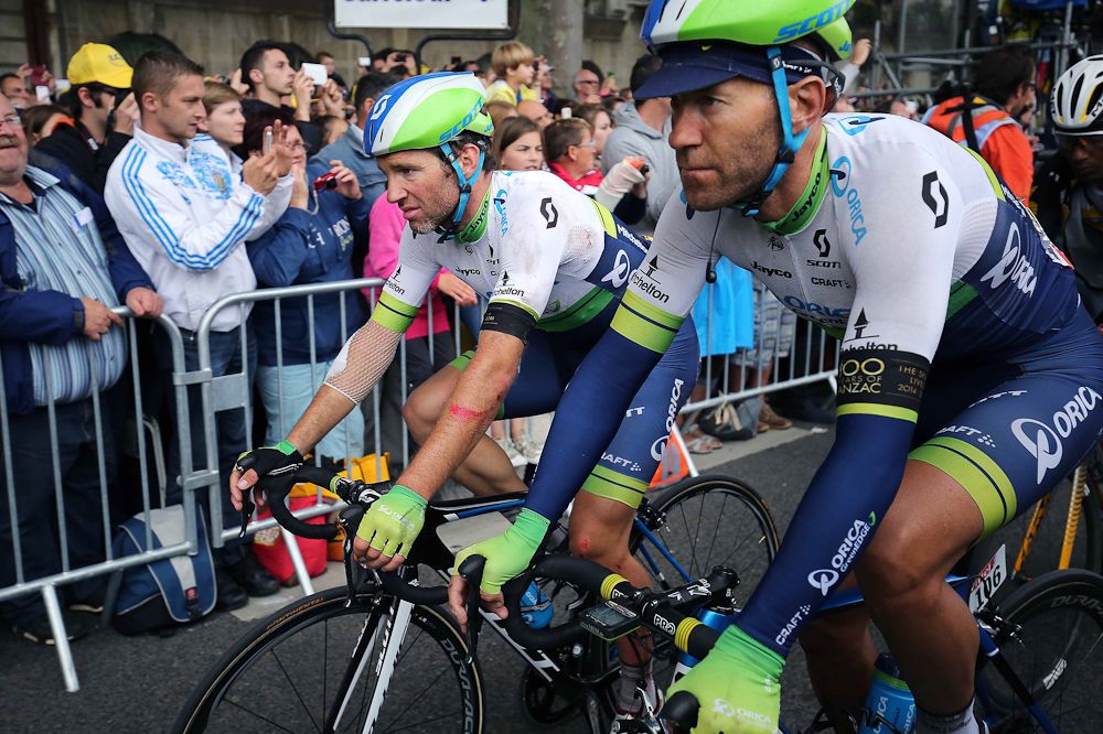 A battered Svein Tuft and Michael Albasini finish stage 5 of the 2015 Tour de France.