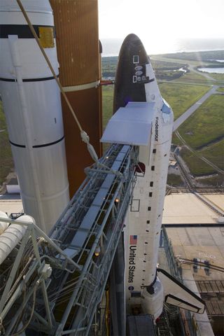 Space shuttle Endeavour stands at Launch Pad 39A near the Atlantic seashore at NASA's Kennedy Space Center in Florida. The shuttle is slated to launch on its final mission, STS-134. 