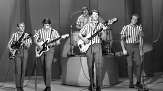 Music group "The Beach Boys" perform on the CBS television program, "The Ed Sullivan Show" in New York, New York, on September 27, 1964. From left is Al Jardine, Carl Wilson, Dennis Wilson, Brian Wilson, Mike Love.