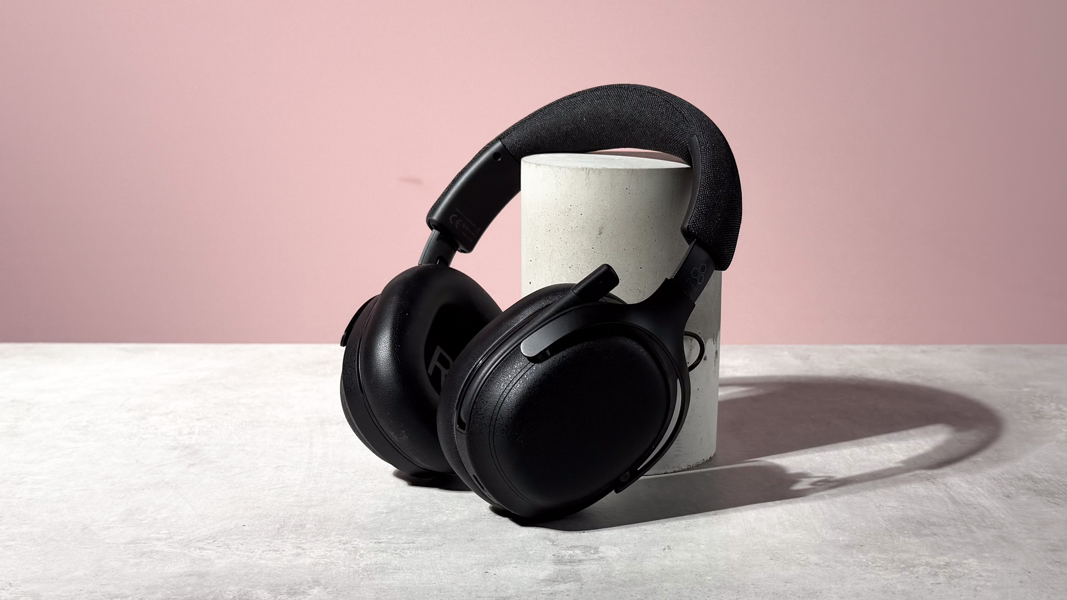 The Final VR3000 EX for Gaming unfolded and leant at a 45 degree angle against a stone and concrete cylinder.
