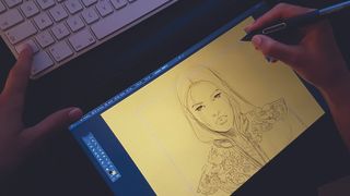 Drawing the woman on a graphics tablet