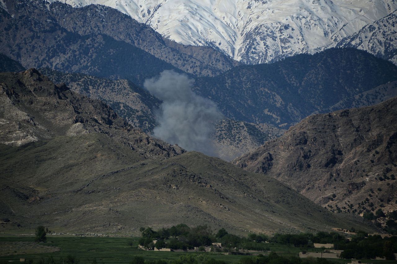 Smoke rises after an air strike on Islamic State.