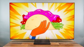 A Samsung R95H Micro RGB TV on a desk