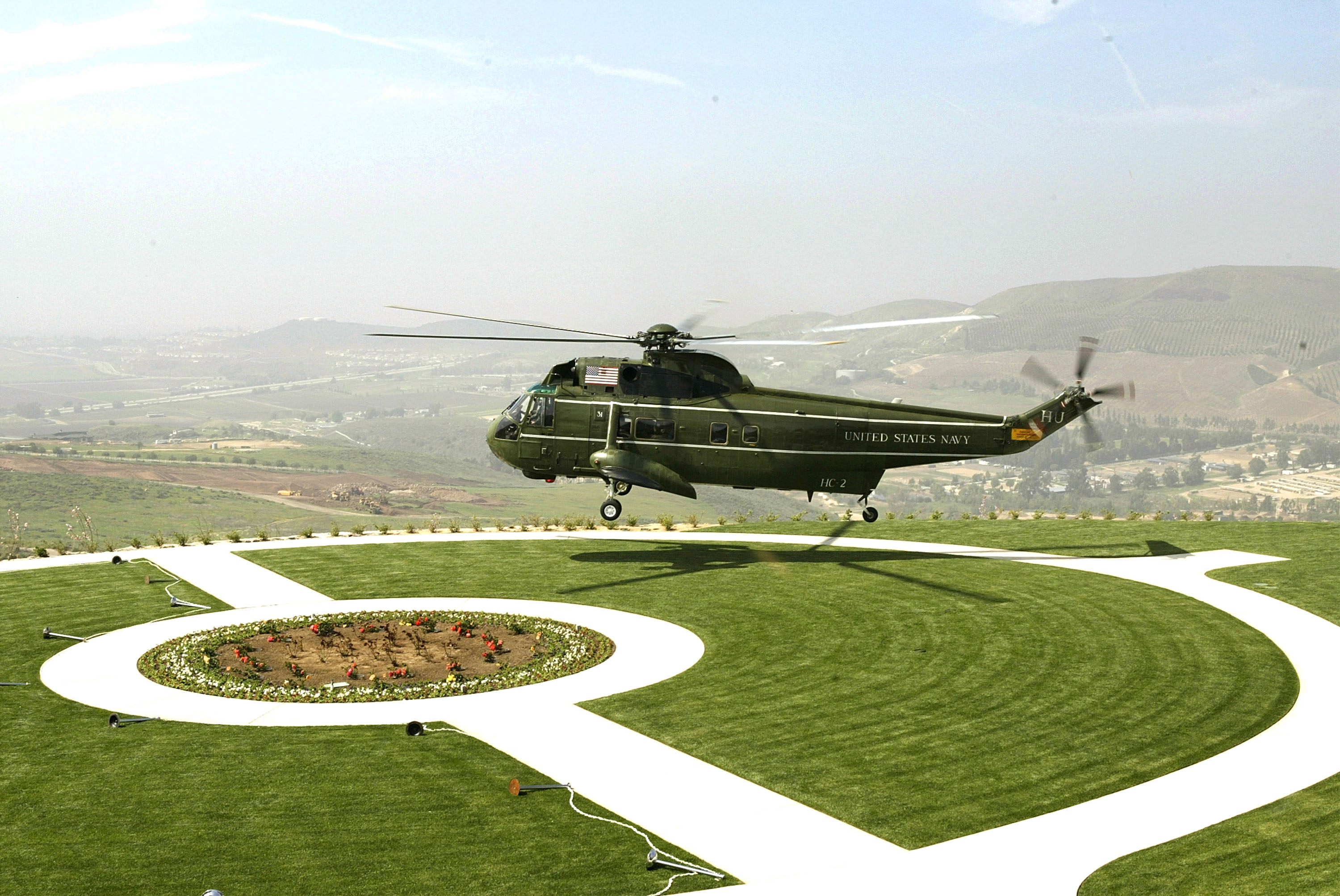 A retired Marine One lands at the Ronald Reagan Library & Museum in Simi Valley, California