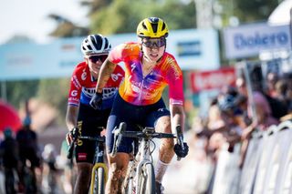 Dutch Lorena Wiebes celebrates as she crosses the finish line to win the women's elite race at the European Gravel cycling Championships, in Heverlee, on October 1, 2023. (Photo by JASPER JACOBS / Belga / AFP) / Belgium OUT