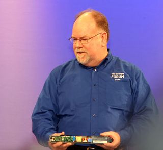 Intel's Tom Aldridge shows off an upcoming power supply that accepts direct DC input.