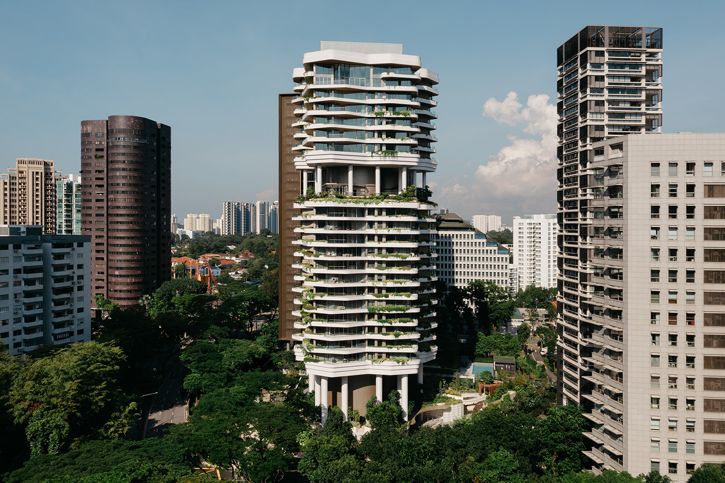 Park Nova, a tower with a vertical garden in Singapore, showing tropical greenery on balconies