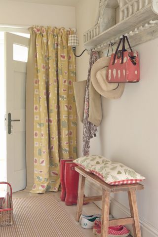 Door curtain at front door in hallway. Fabric by Vanessa Arbuthnott