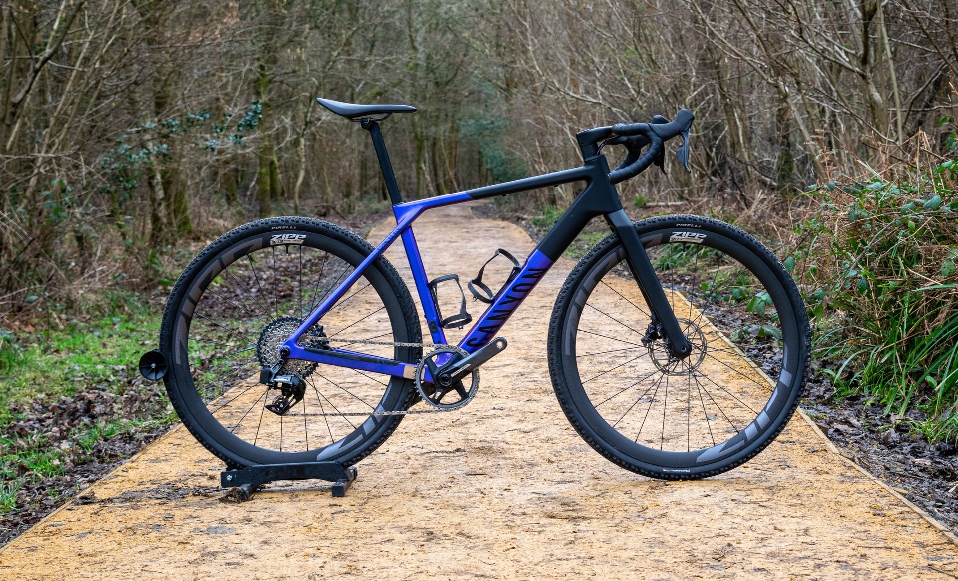 A 2nd gen Canyon Grail CF SLX in some woods 