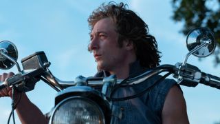 A press image of Jeremy Allen White on a motorcycle in The Iron Claw.