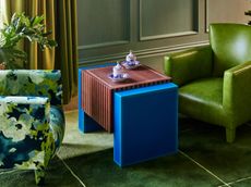 a blue tea table in a green living room