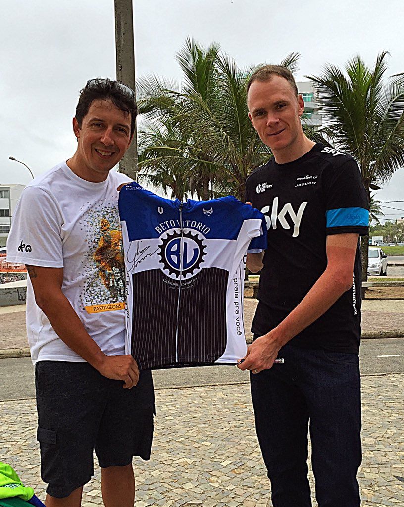 Chris Froome and local cyclist Roberto Vitorio