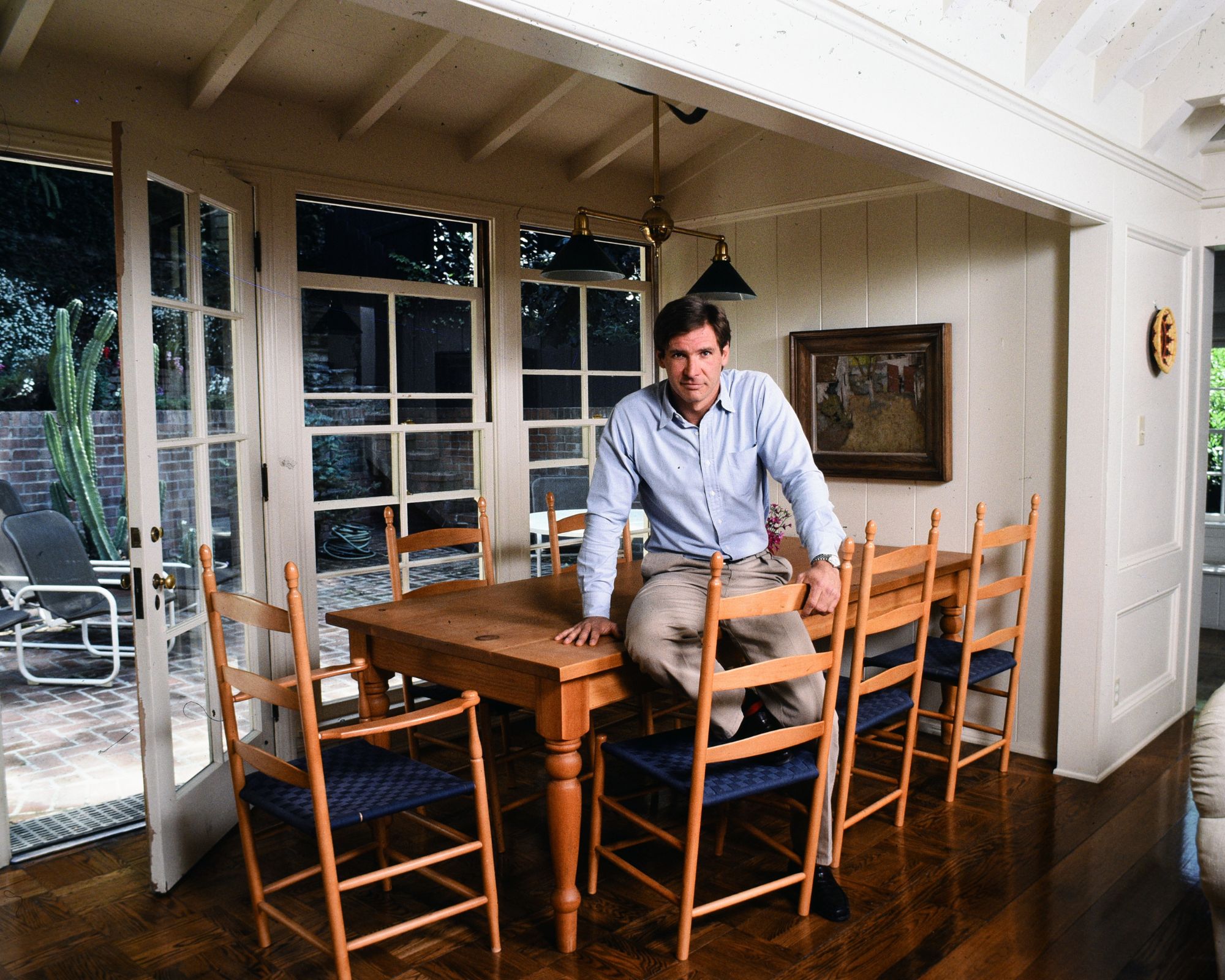 harrison ford with his wooden table and chairs