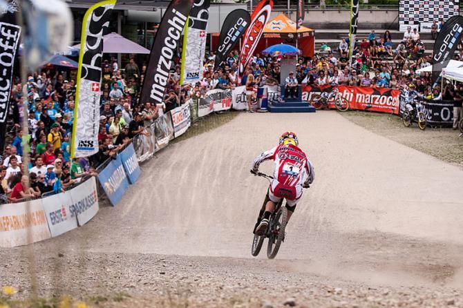 A racer finishes up a round of the iXS European Downhill Cup in Leogang