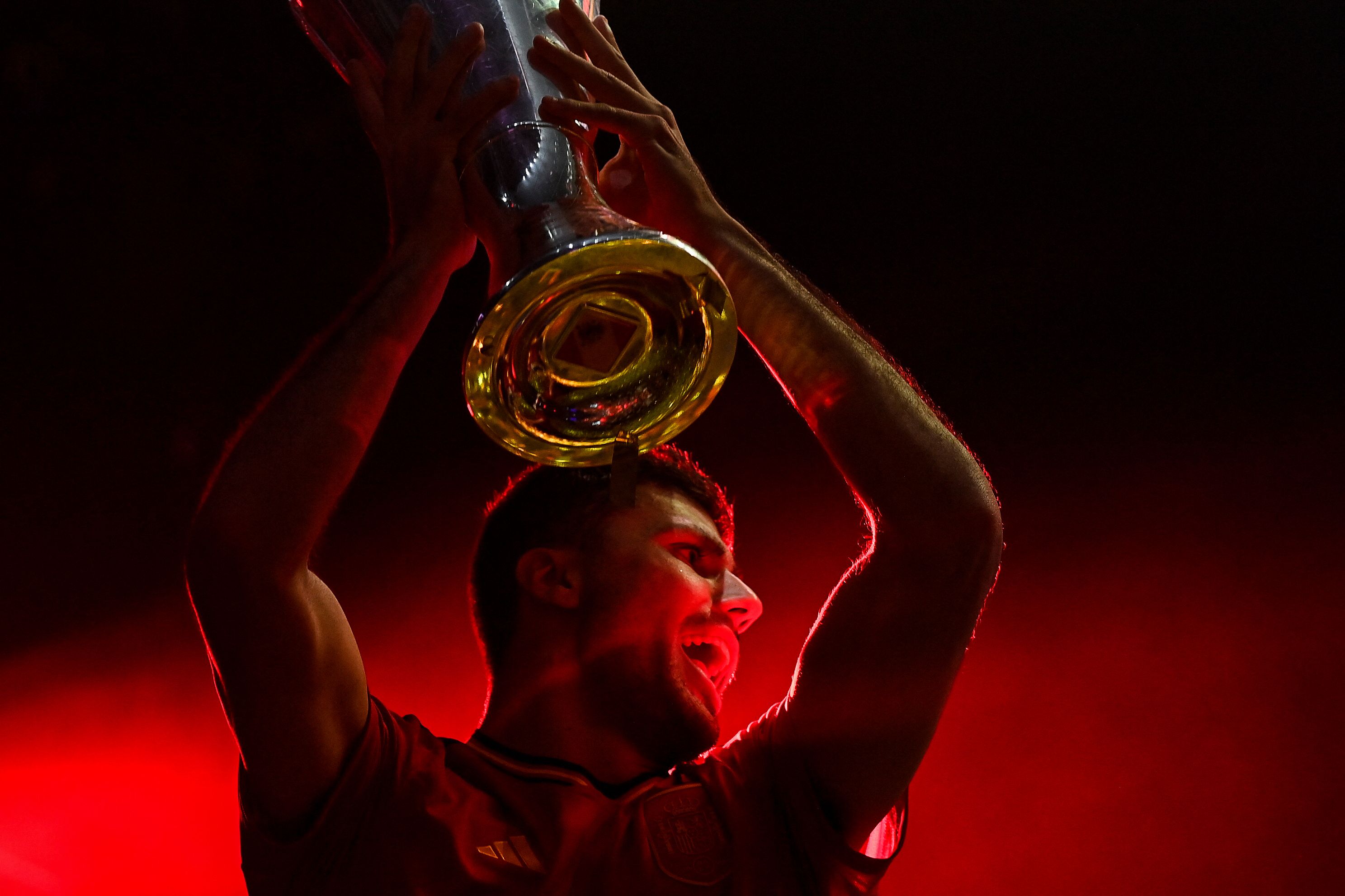 Rodri celebrates with the UEFA Nations League trophy after Spain's win in the final against Croatia in June 2023.