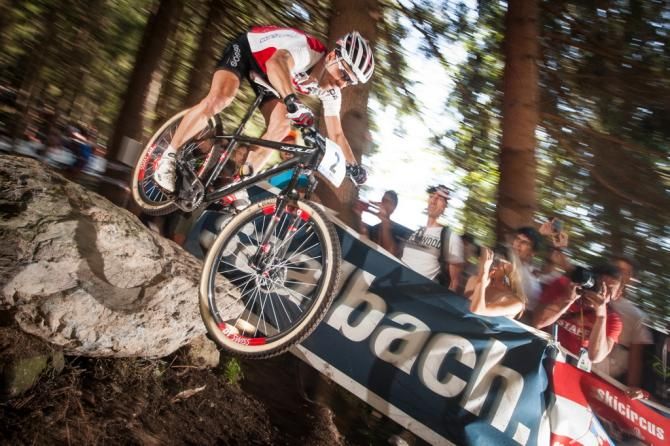Nino Schurter races for the rainbow jersey in Saalfelden, Austria