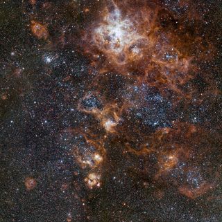 This image from VLT Survey Telescope at ESO'S Paranal Observatory in Chile showcases the brilliant Tarantula Nebula in the Large Magellanic Cloud.