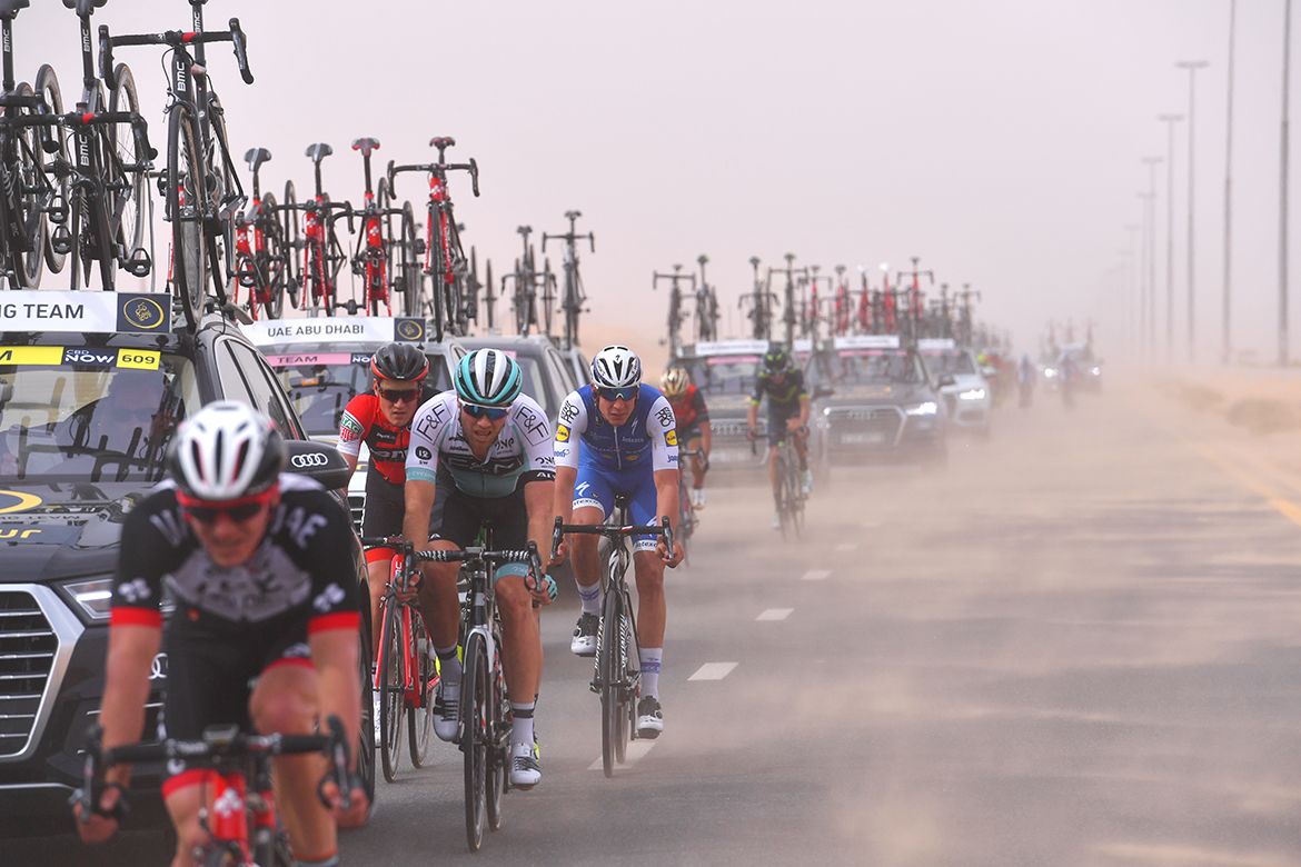 Riders in single file as wins batters the group