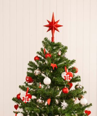 Real Christmas tree with lights and decorations