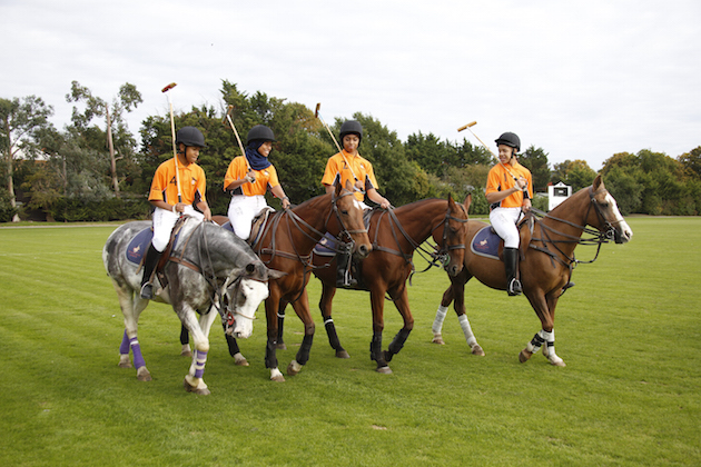 The-young-Ebony-team-ride-onto-the-field.jpg
