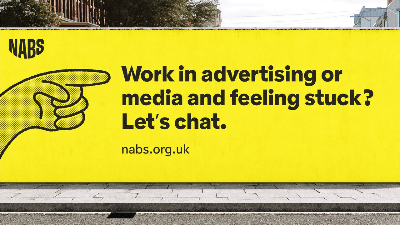 NABS rebrand - work in advertising and media and feeling stuck? Let's chat text on billboard