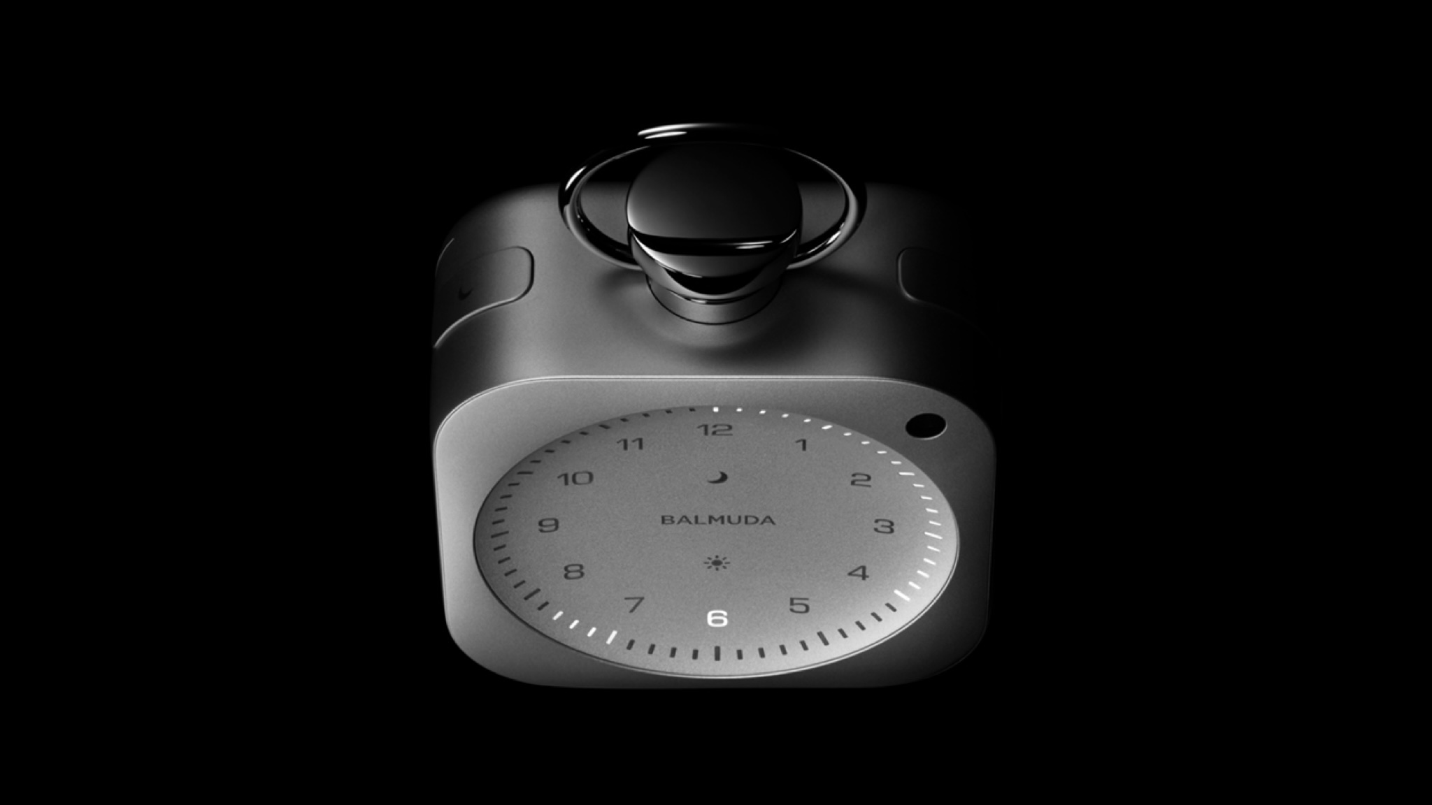 Balmuda The Clock product photo from slightly overhead against a black background