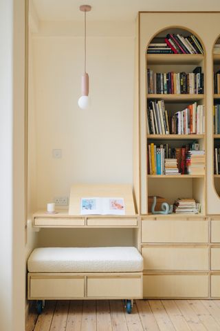 plywood built ins with a pull out stool