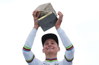 Alpecin - Deceuninck team's Dutch rider Mathieu Van Der Poel celebrates on the podium after winning the 121st edition of the Paris-Roubaix one-day classic cycling race, 260km between Compiegne and Roubaix, northern France, on April 7, 2024. (Photo by Francois LO PRESTI / AFP)