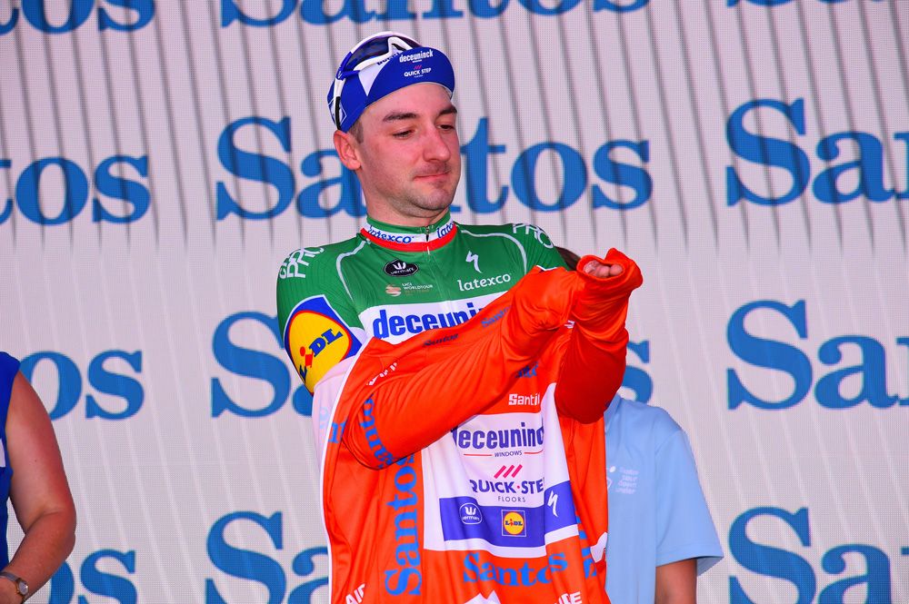 Elia Viviani (Deceuninck - Quick-Step) pulls on the Tour Down Under ochre leader's jersey