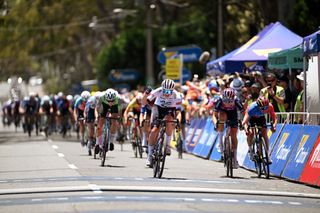 Ally Wollaston (AG Insurance Soudal) wins stage 1 in a bunch sprint ahead of Georgia Baker (Liv AlUla Jayco) and Sofia Bertizzolo (UAE Team ADQ)