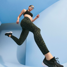 A woman exercising whilst wearing Sweaty Betty workout wear.