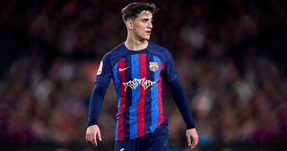 Gavi of FC Barcelona looks on during the LaLiga Santander match between FC Barcelona and Real Madrid CF at Spotify Camp Nou on March 19, 2023 in Barcelona, Spain.