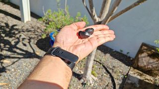 Sennheiser Accentum buds held in hand