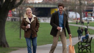 Florence Pugh and Andrew Garfield&#039;s characters taking a stroll in comedy-drama We Live in Time