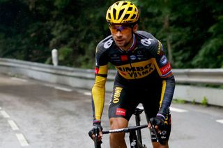 Team Jumbo Vismas Primoz Roglic of Slovenia rides behind the pack during the 8th stage of the 108th edition of the Tour de France cycling race 150 km between Oyonnax and Le GrandBornand on July 03 2021 Photo by Thomas SAMSON AFP Photo by THOMAS SAMSONAFP via Getty Images