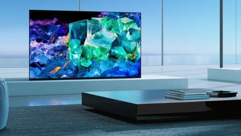 Sony A95K QD-OLED TV in front of windows in a living room