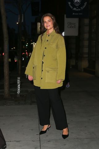 Katie Holmes styles an oversized Everlane coat with sharp kitten heels