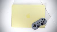 Apple MacBook Neo in Citrus colour.