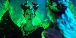 Maleficent: Mistress of Evil with a pleading look towards Aurora
