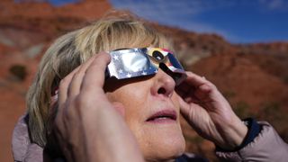Woman viewing solar eclipse